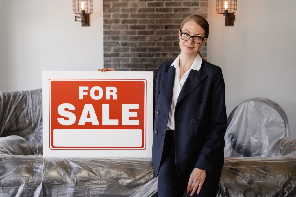 rent or sell home before moving abroad Section 121 tax — photo by MART PRODUCTION via Pexels