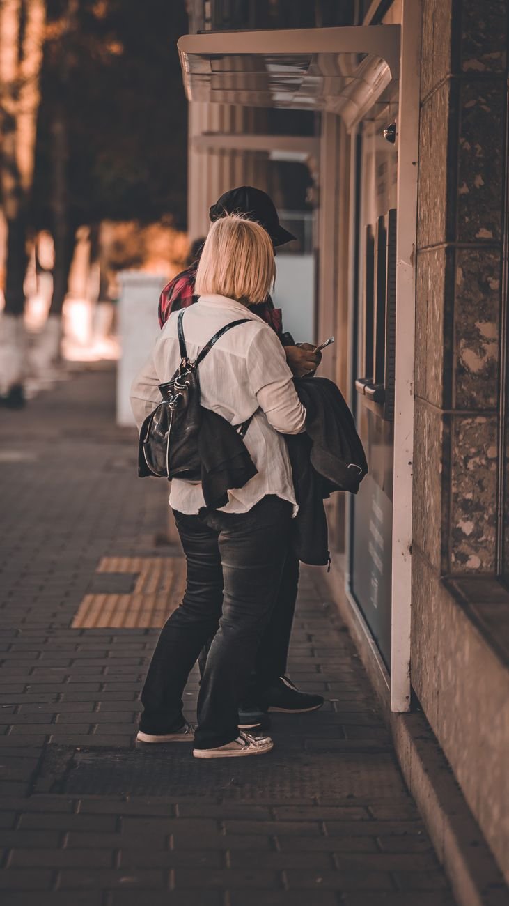 casual style couple on sidewalk