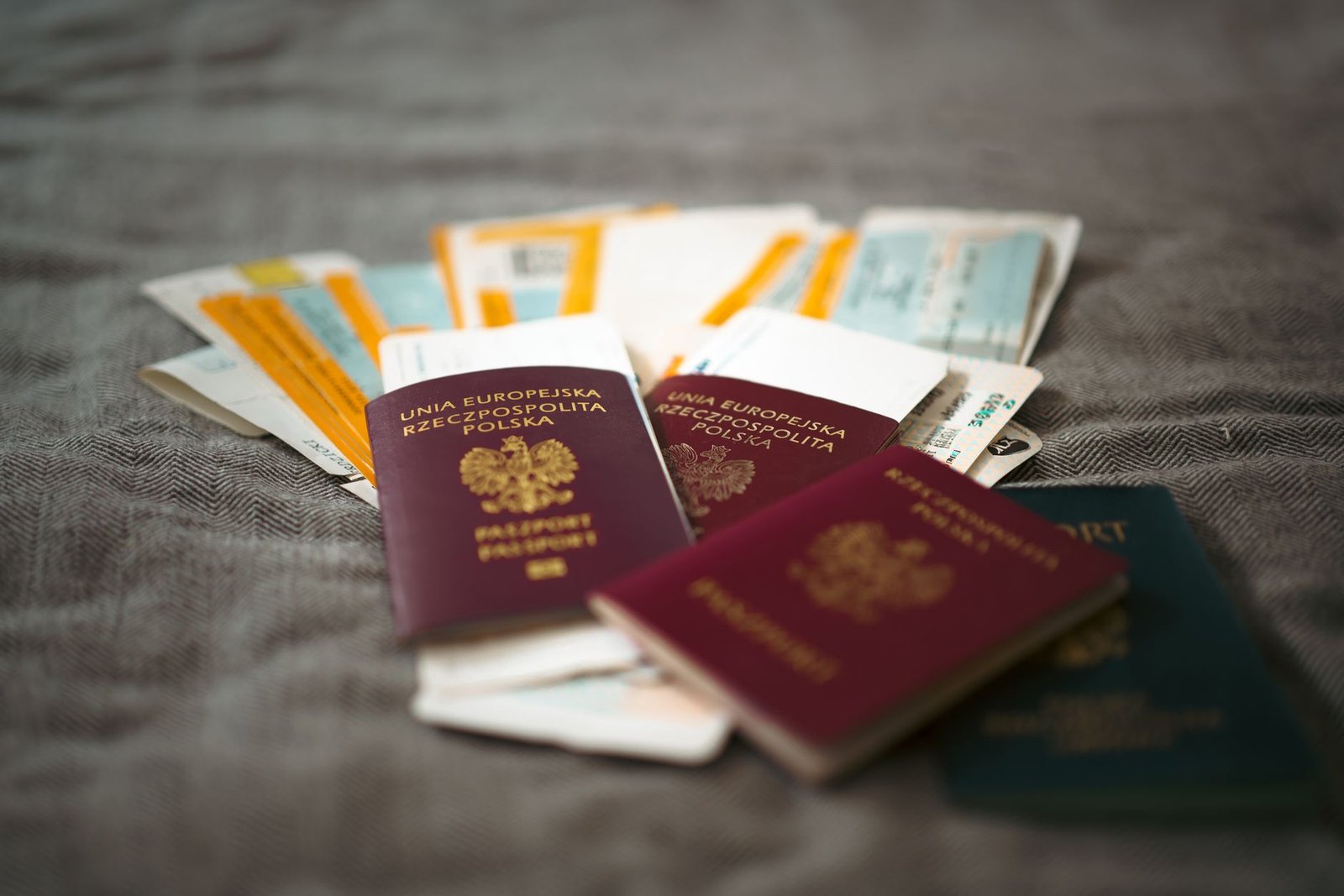 Passports and travel documents laid out on a table