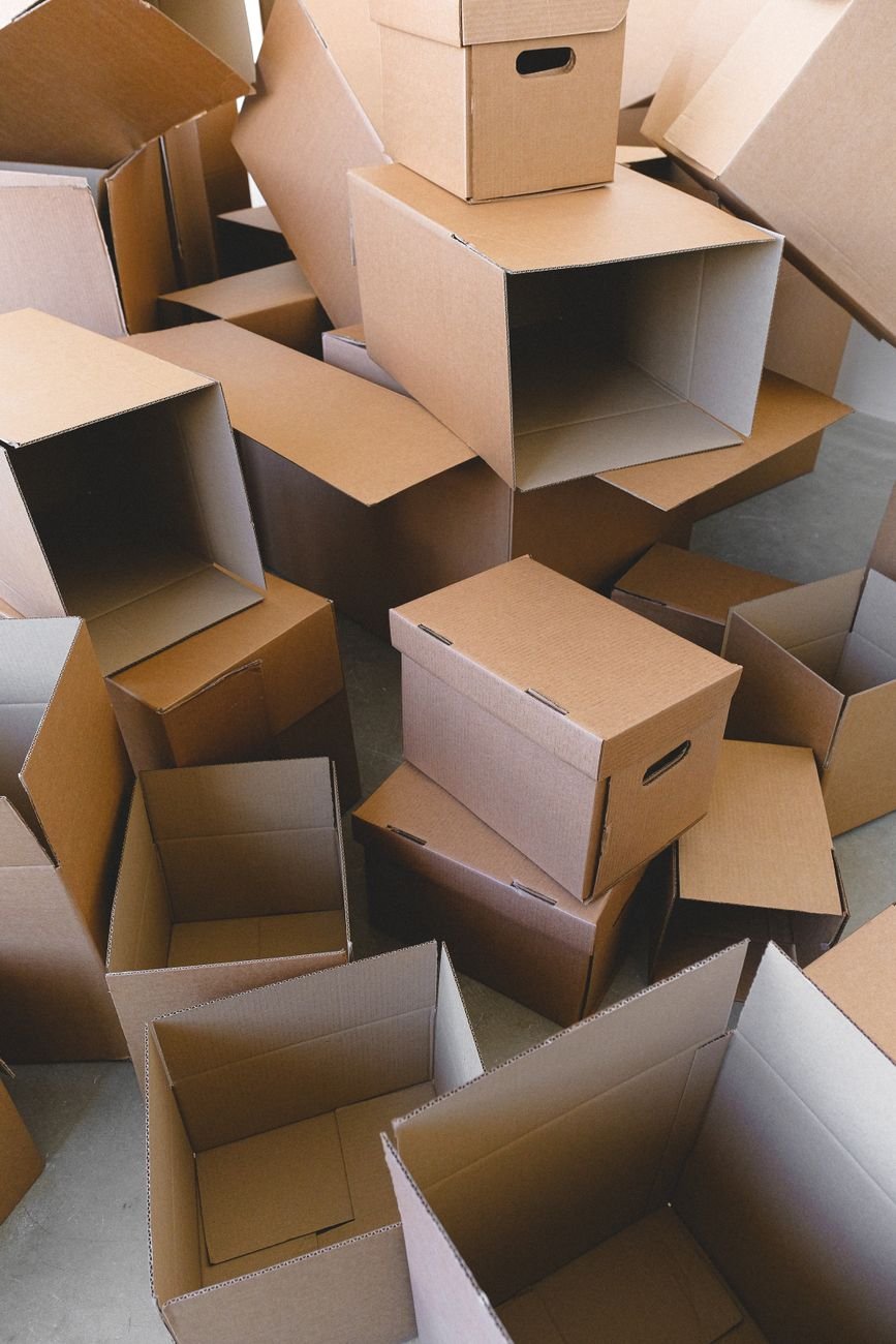 Stack of cardboard moving boxes prepared for relocation