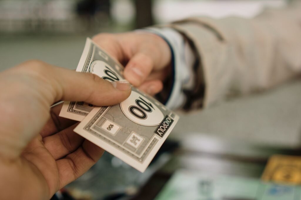 debt settlement before moving abroad negotiate — photo by Berna via Pexels